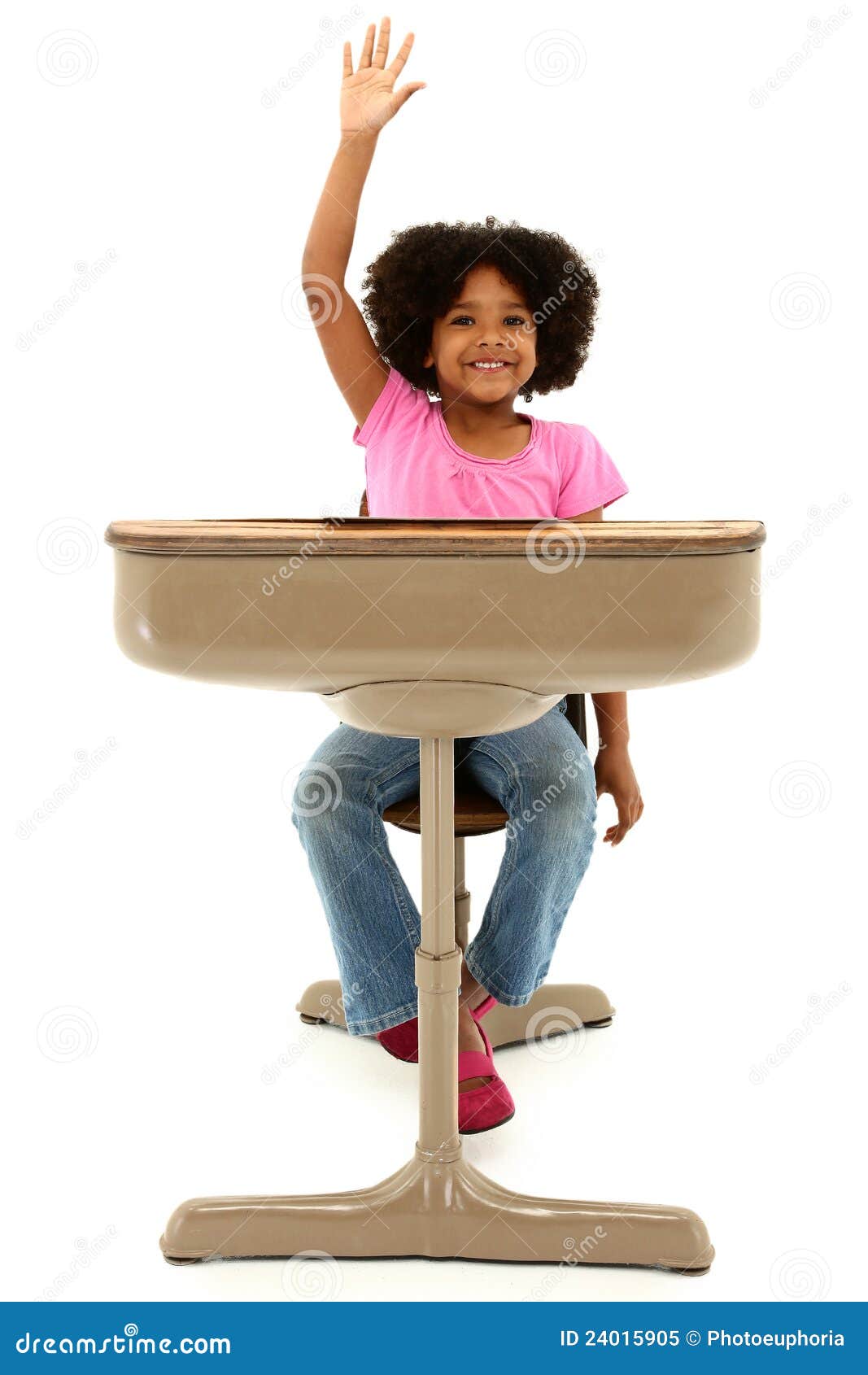 Beautiful African American Child Sitting In A Desk Stock Image