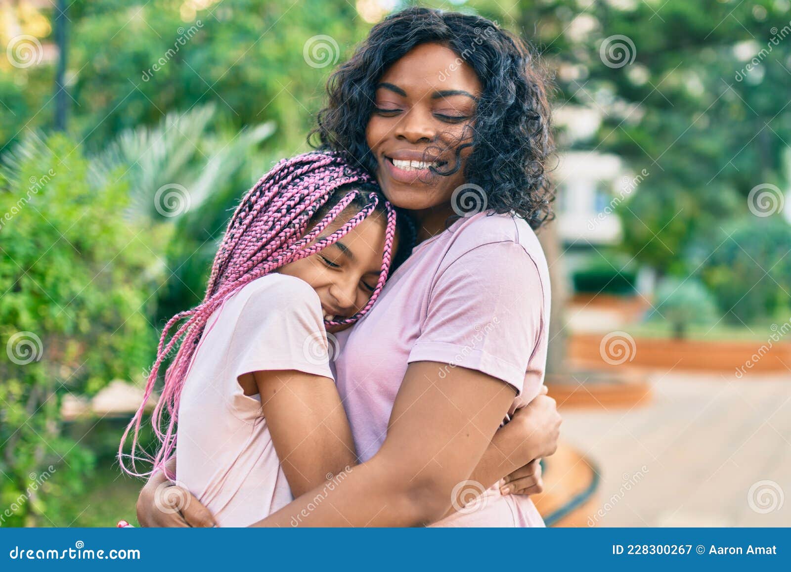 Beautiful African American Mother And Daughter Smiling Happy And Hugging Stock Image Image Of 