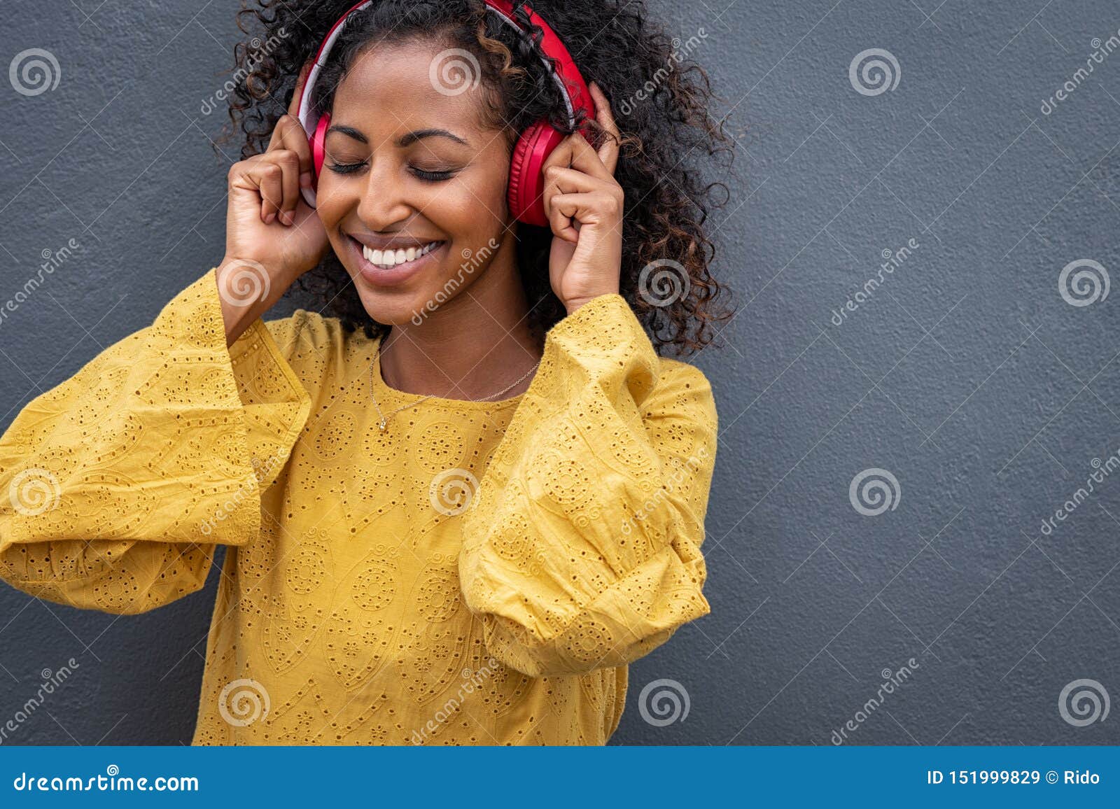 Beautiful African Woman Listening To Music Stock Photo   Download Image