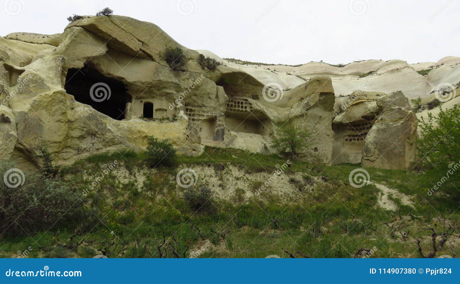beautiful ancient cave houses in remote area of cappadocia`s landscape