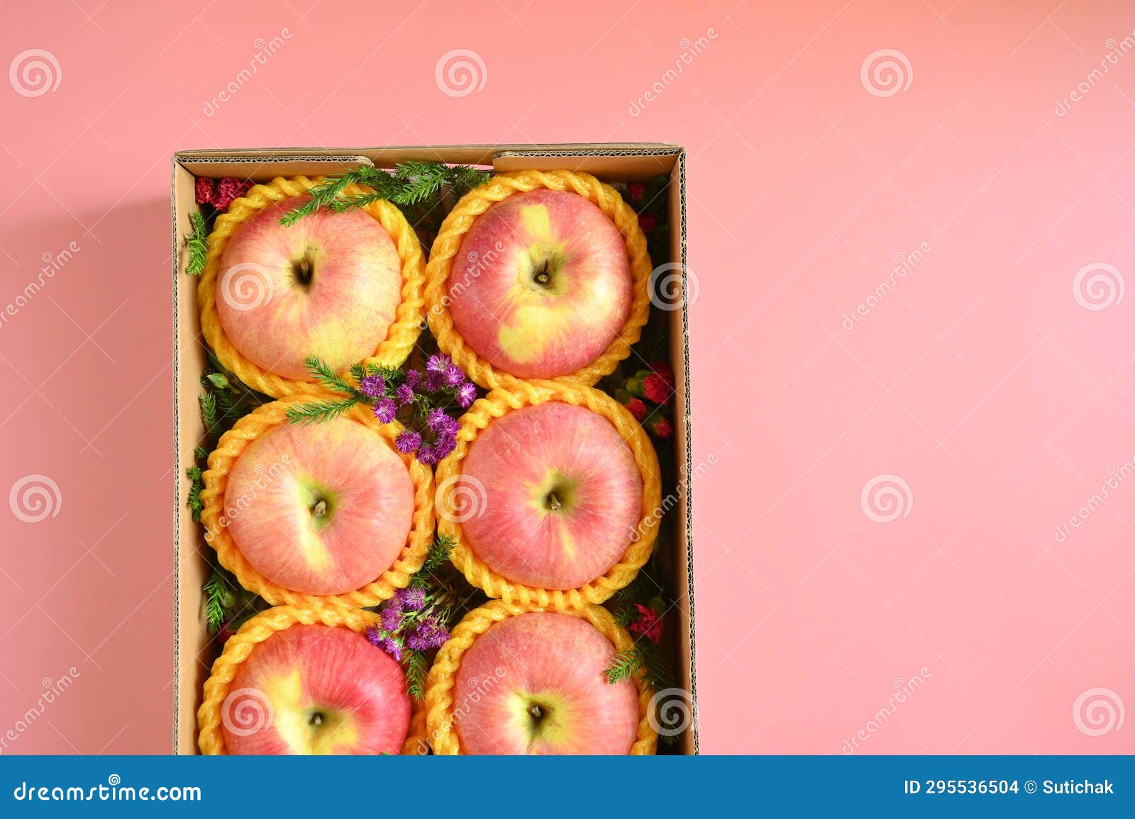 Beautiful Apple in the Box on Pink Background, Healthy Fruit Stock