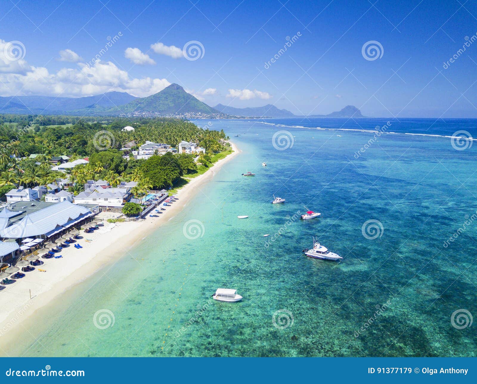 beautiful areal view of beach with boats on mauritius island