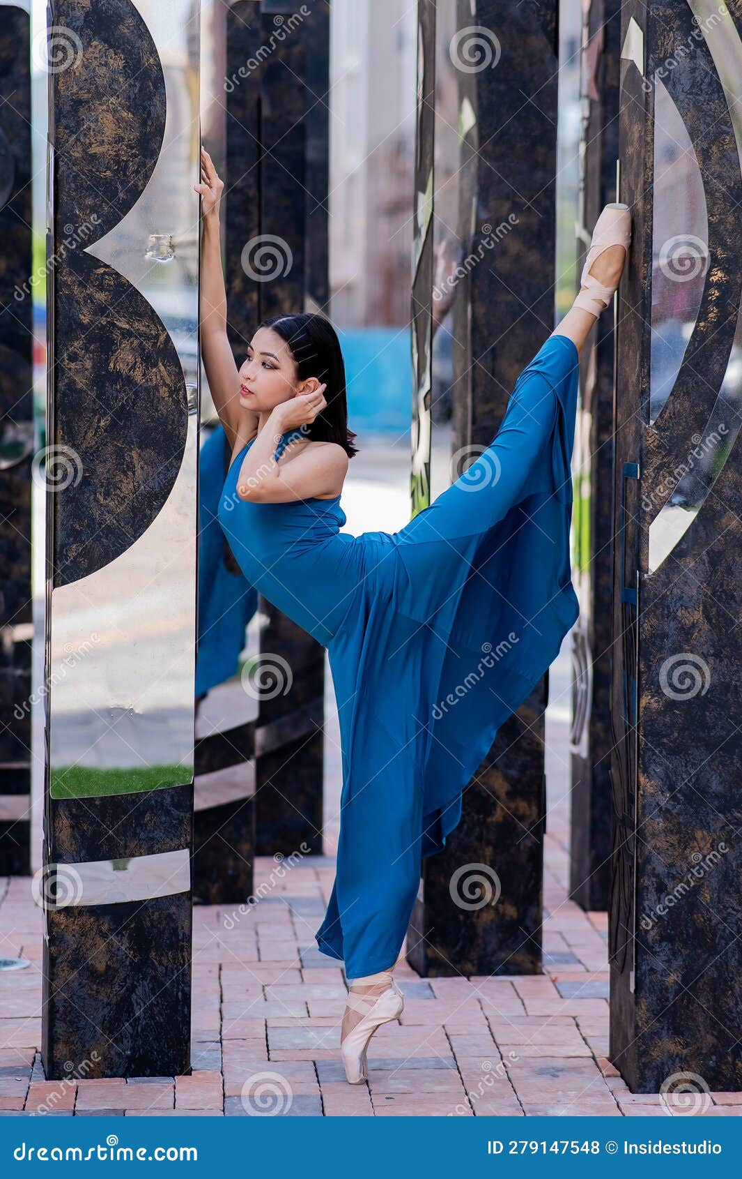 Beautiful Asian Ballerina in Blue Dress and Pointe Shoes Posing ...