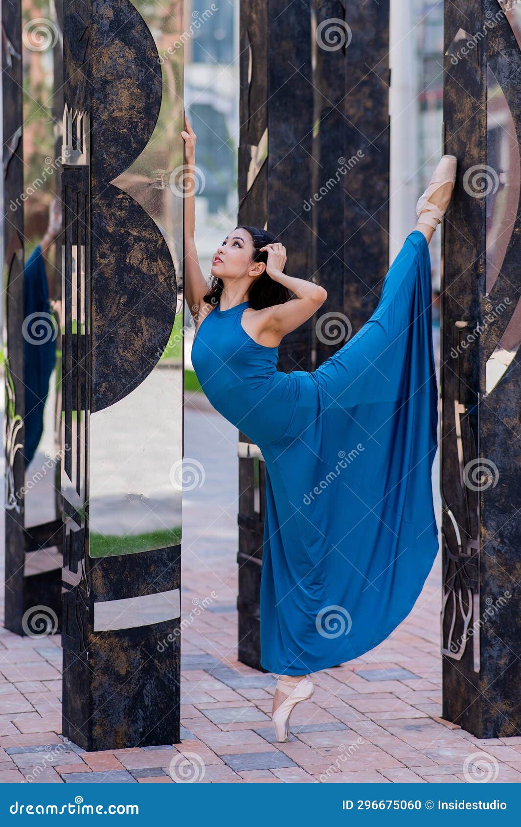 Beautiful Asian Ballerina in Blue Dress and Pointe Shoes Posing ...