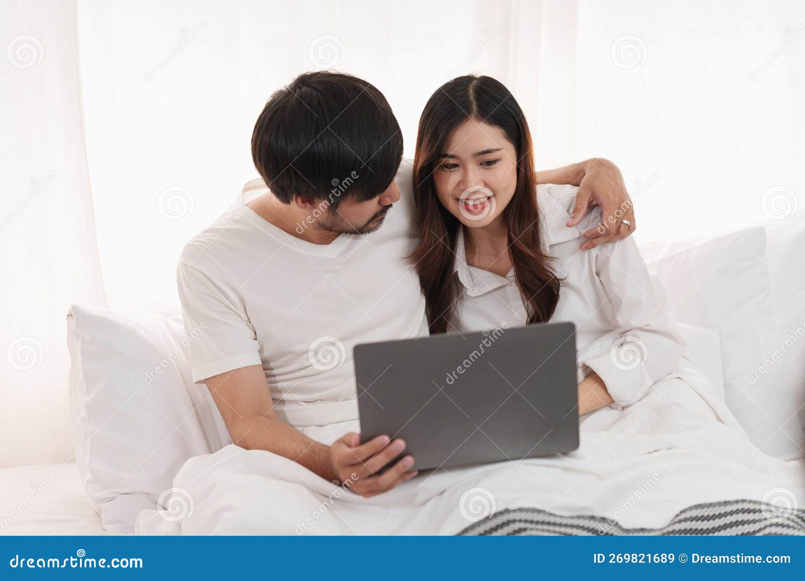 Beautiful Asian Couple In Love And Smiling Sitting On Bed Romantic Moment Relationships