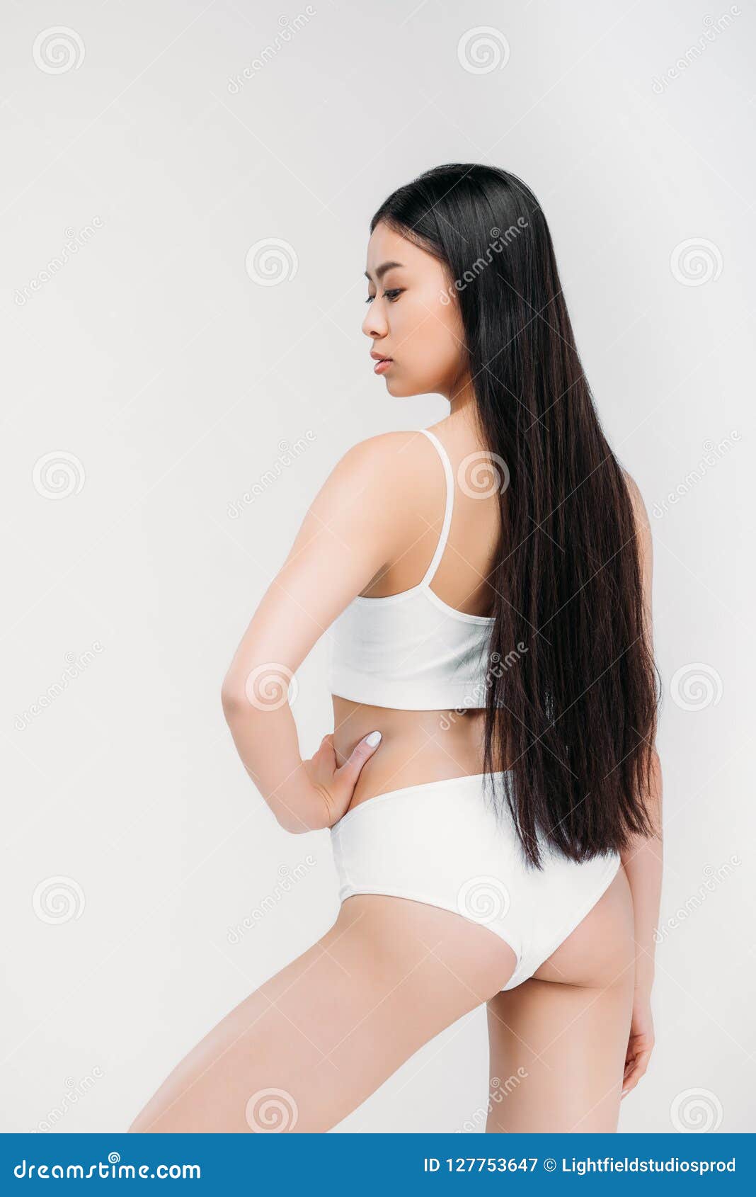 Elegant Sensual Asian Girl Posing In White Underwear Stock Photo