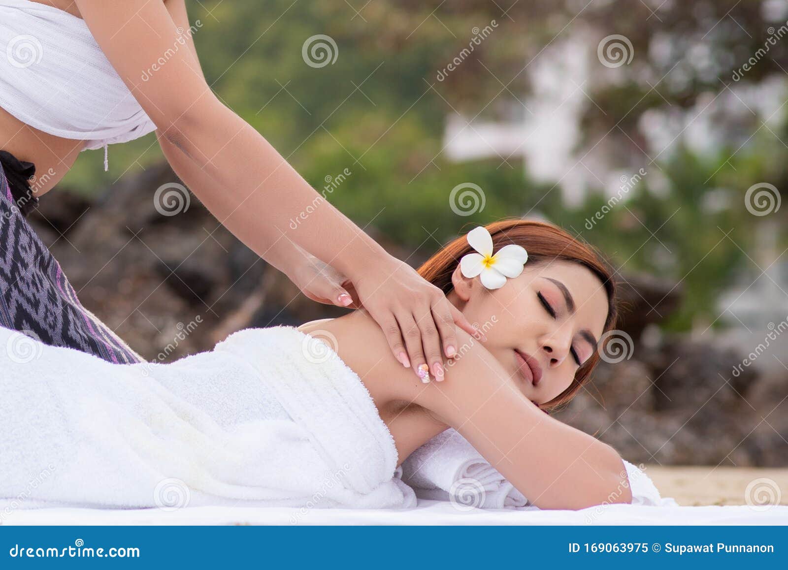 Beautiful Asian Woman Enjoying Spa Massage Therapy on the Beach Stock Image  image