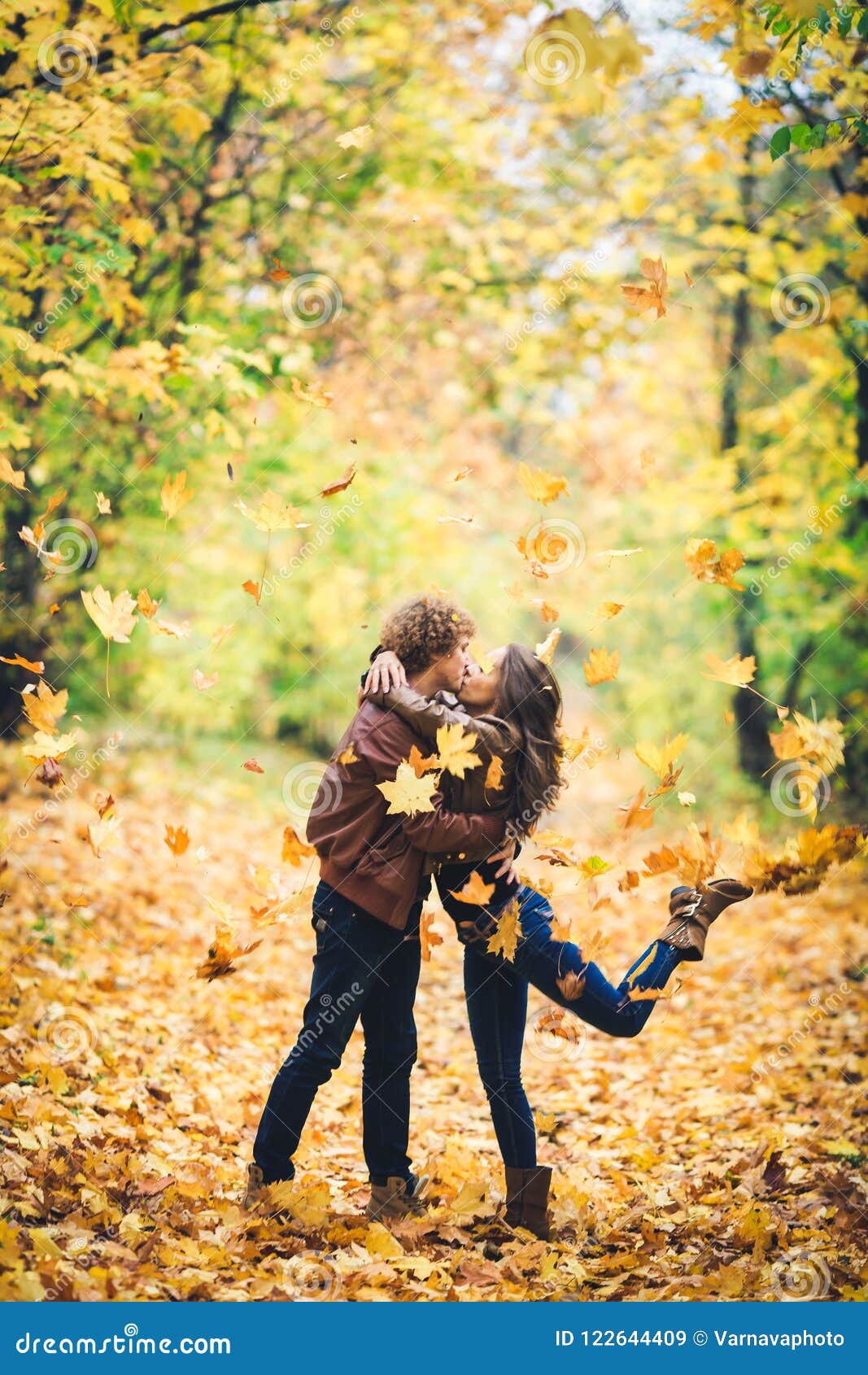 Beautiful Autumn Alley Of Maples Loving Couple Kisses And Yellow