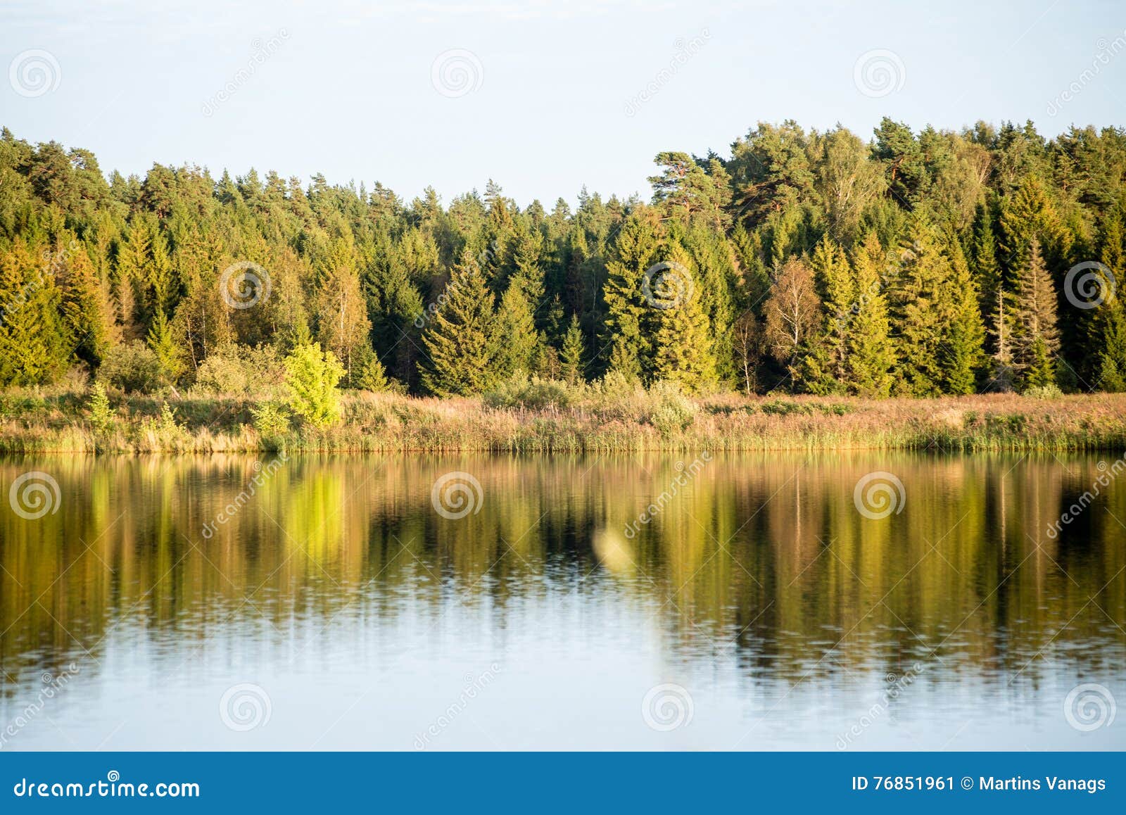 Beautiful Autumn Sunset At The Lake With Blue Sky Red And Orange