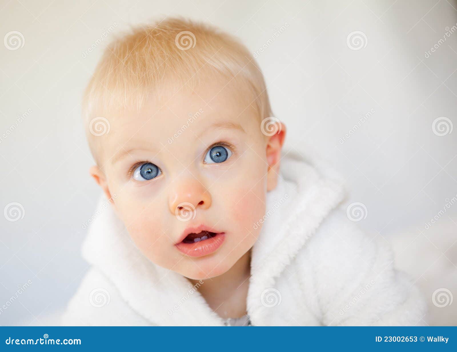 A Beautiful Baby Boy with Big Blue Eyes Stock Image Image of white
