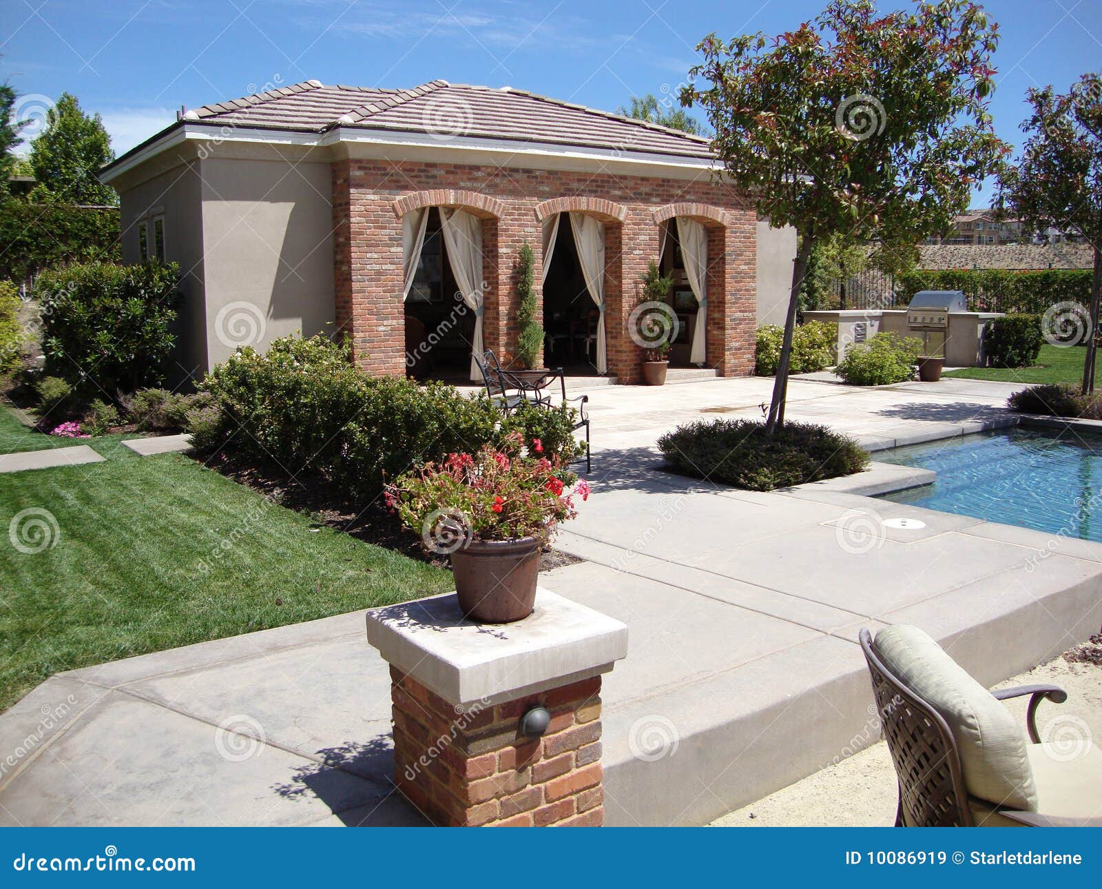 beautiful backyard with pool and cabana