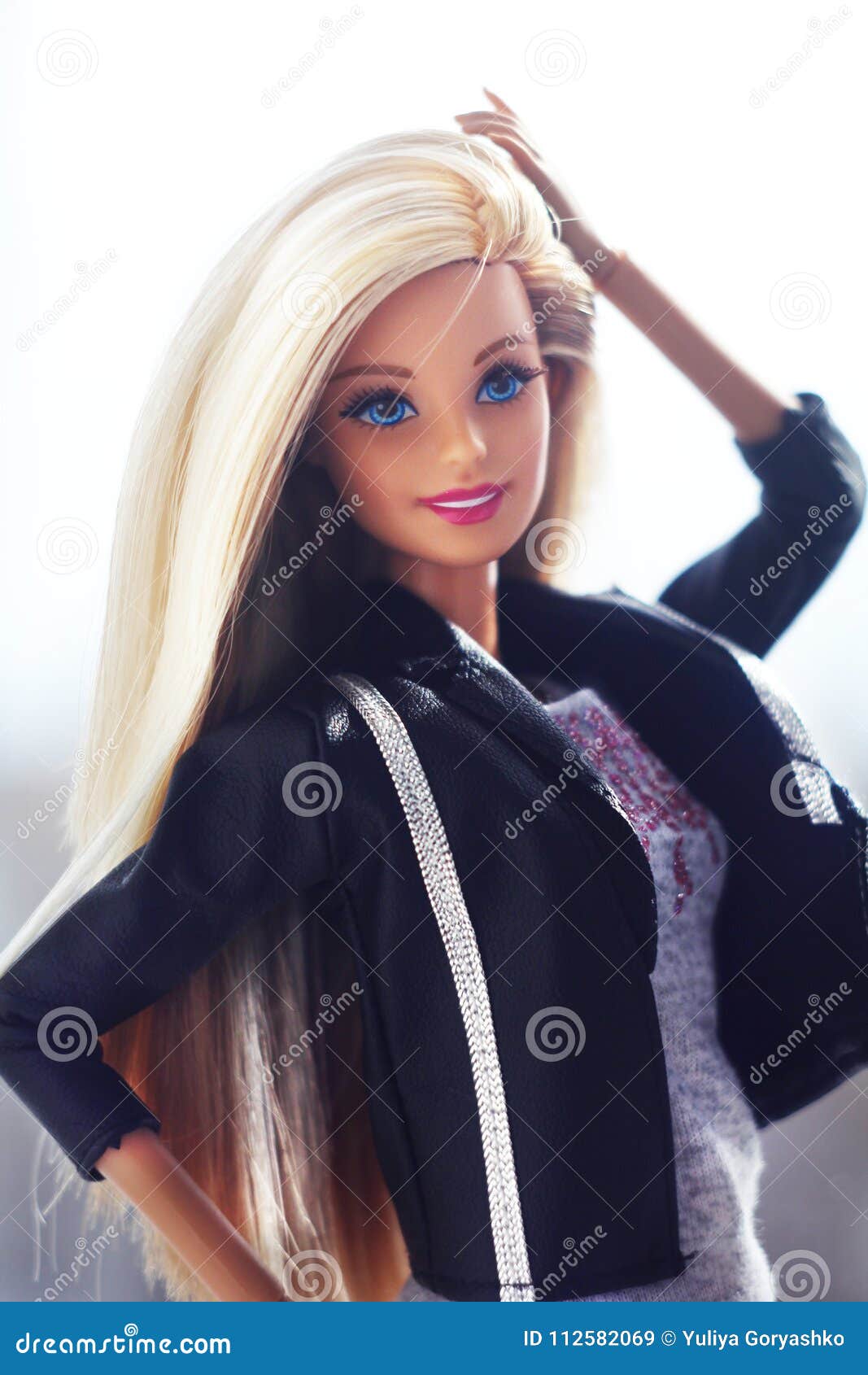 A Beautiful Barbie with White and Brown Hair. Stylish Blondy Doll ...