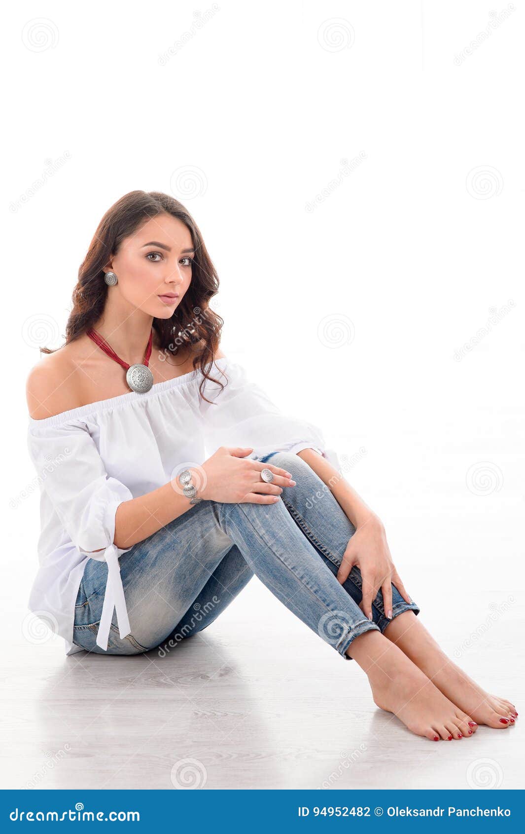 Beautiful Barefoot Woman Sitting on the Floor with Her Long Brow Stock ...