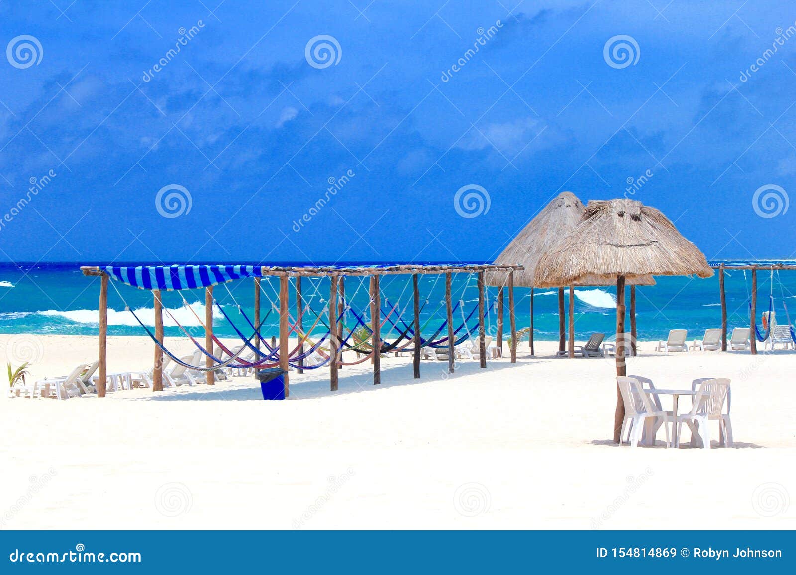 beautiful beach in the bahamas with hammocks
