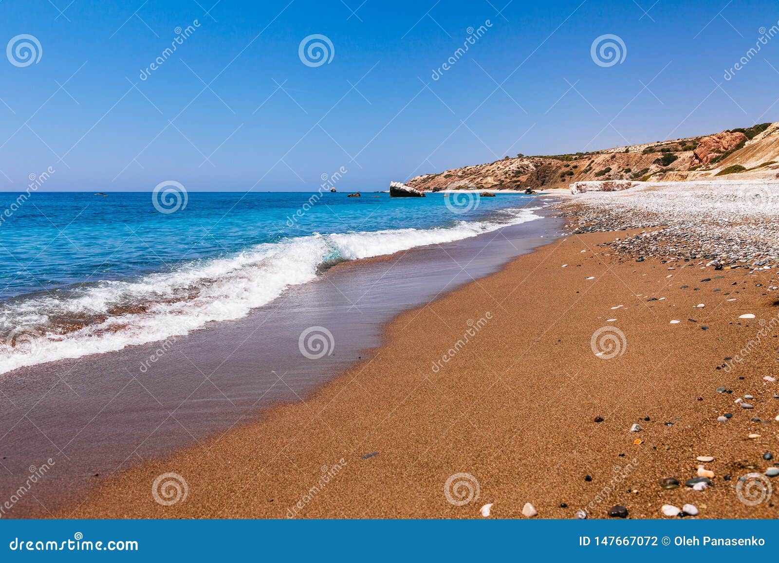 beautiful beach on petra tou romiou (the rock of the greek), aphrodite's legendary birthplace in paphos, cyprus island,