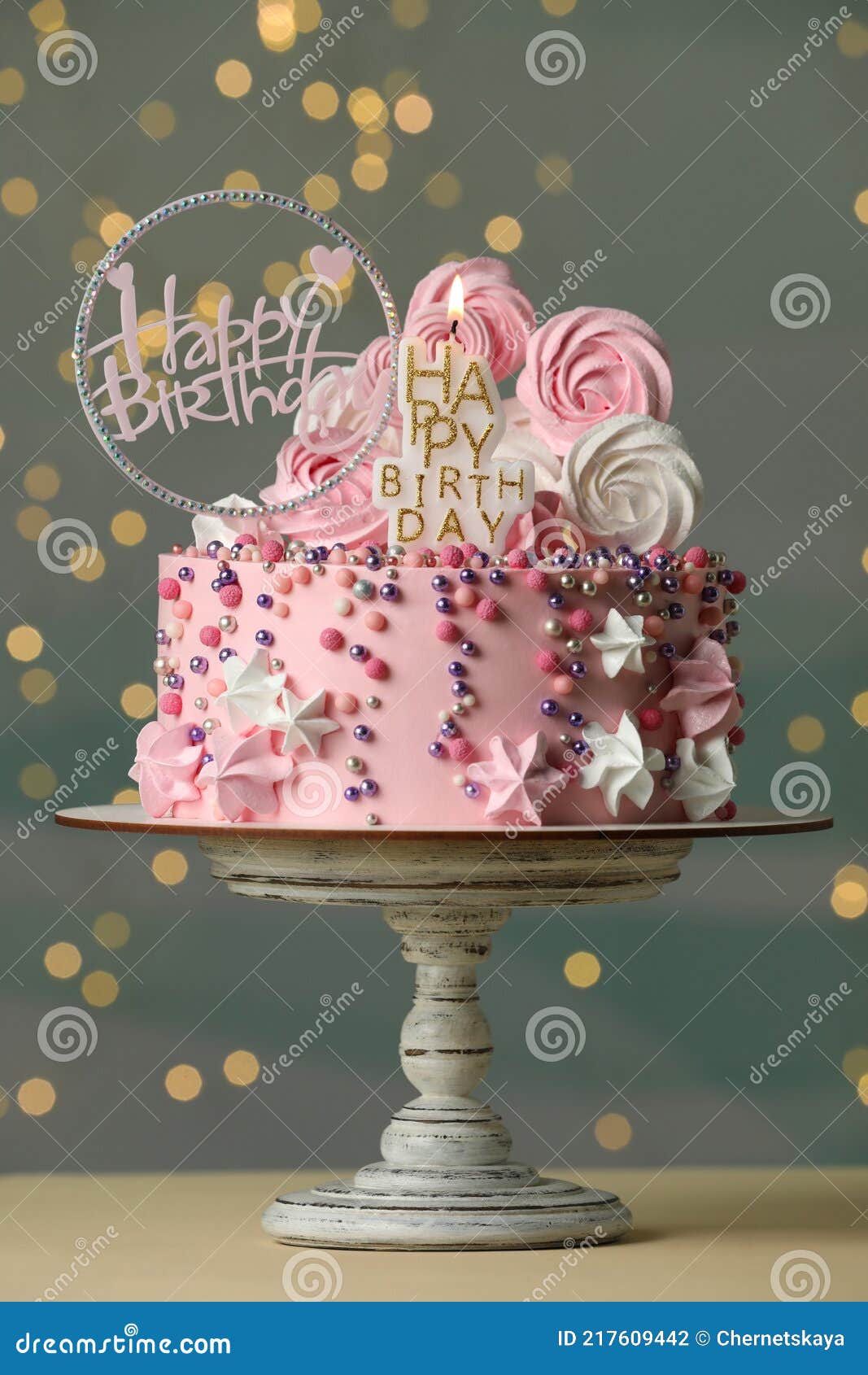 Beautiful Birthday Cake with Festive Decor and Candle on White ...