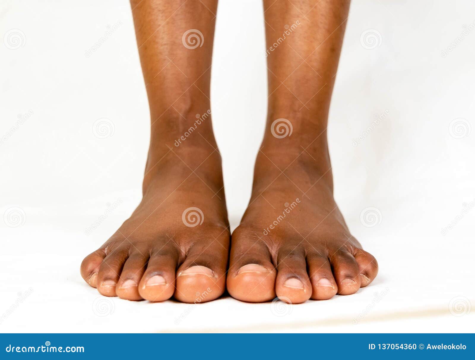 Ebony feet in face