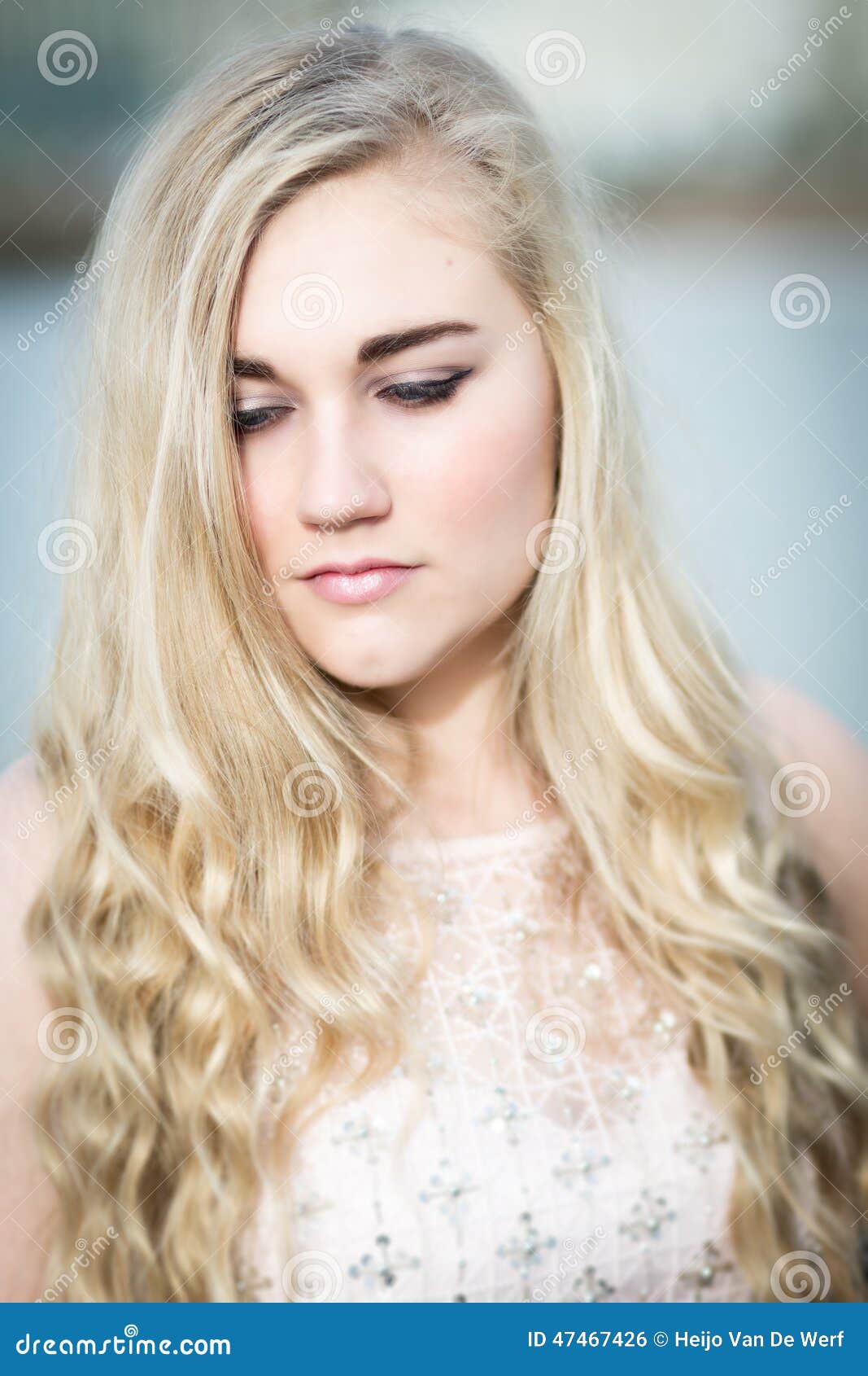 Blue eyes blonde hair girl on back