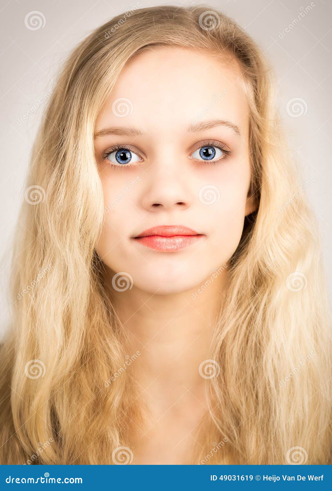 Beautiful Blond Teenage Girl Looking In The Camera Stock