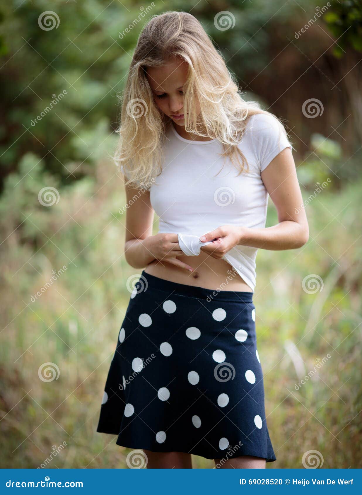 Portrait Of A Beautiful Dark Blond Teenage Girl In A