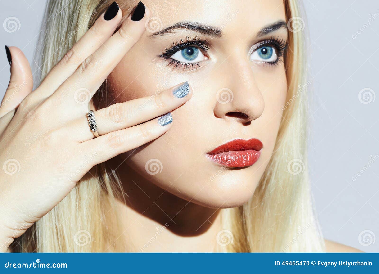 beautiful blond woman with manicure.beauty girl.shellac nail .young woman with red lips