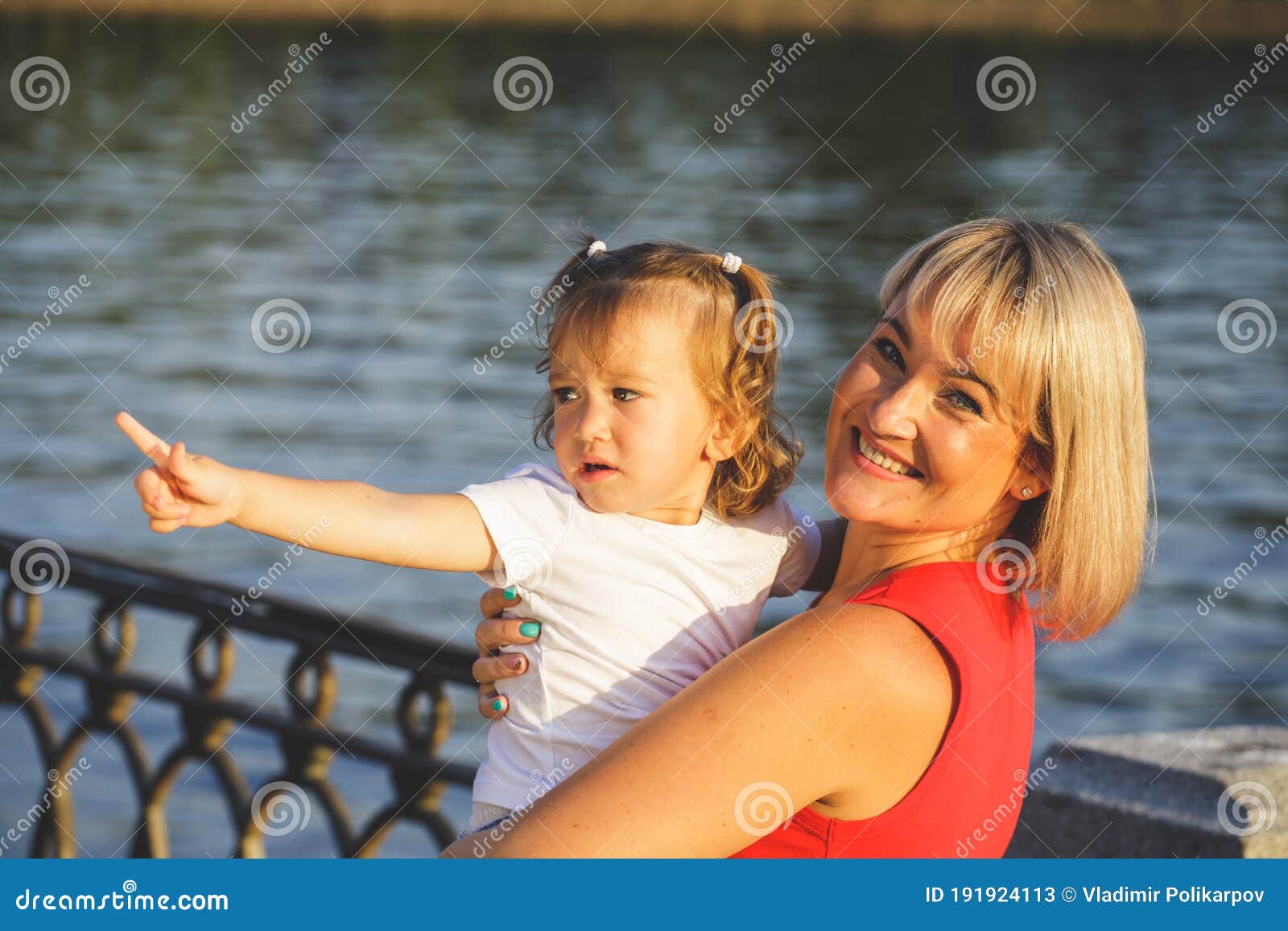 Beautiful Blonde Mom In A Red T Shirt With Her Daughter Group Portrait Stock Image Image Of