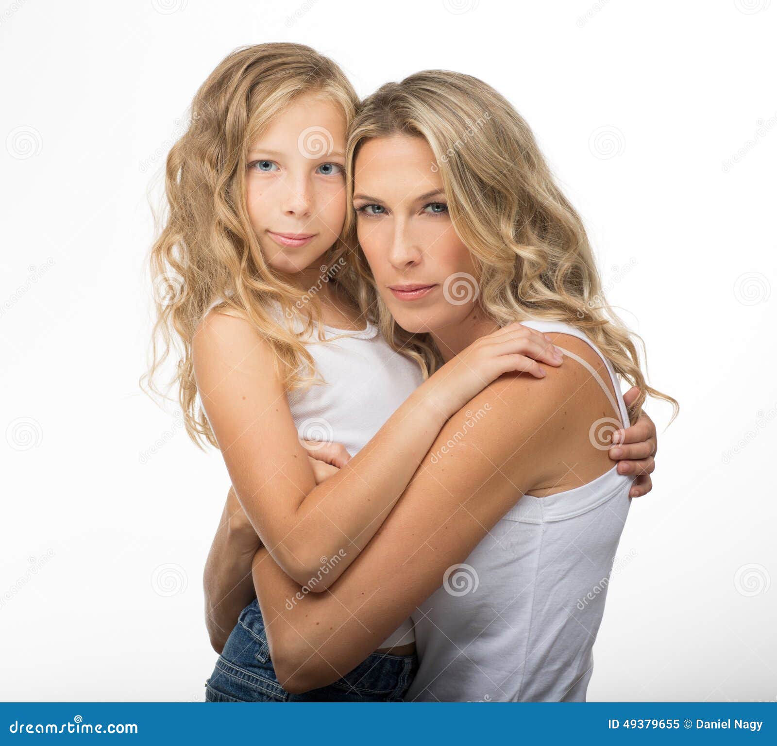 Beautiful Blonde Mother And Daughter Hugs Each Other Stock