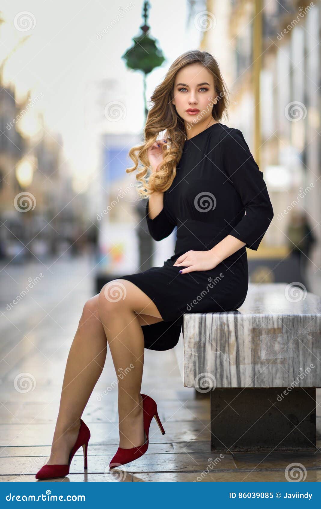 Beautiful Blonde Russian Woman In Urban Background Stock