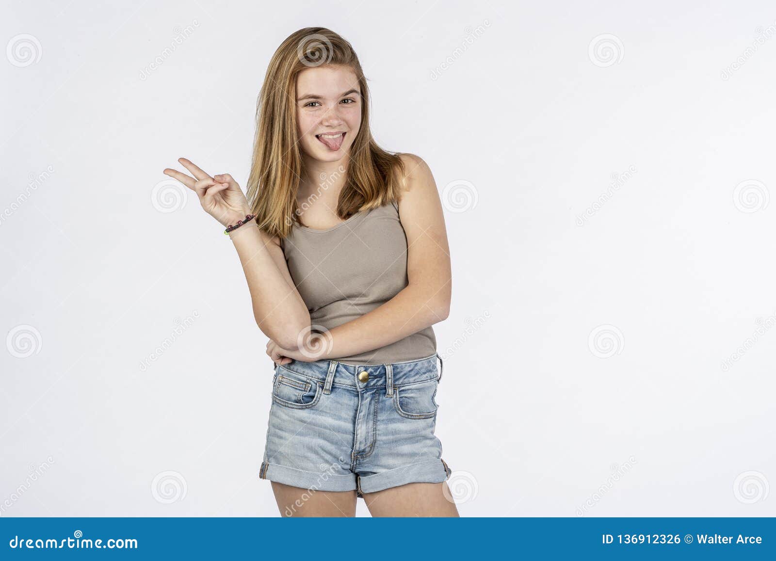 Portrait Of Teenage Girl With Gorgeous Blond Hair Posing 