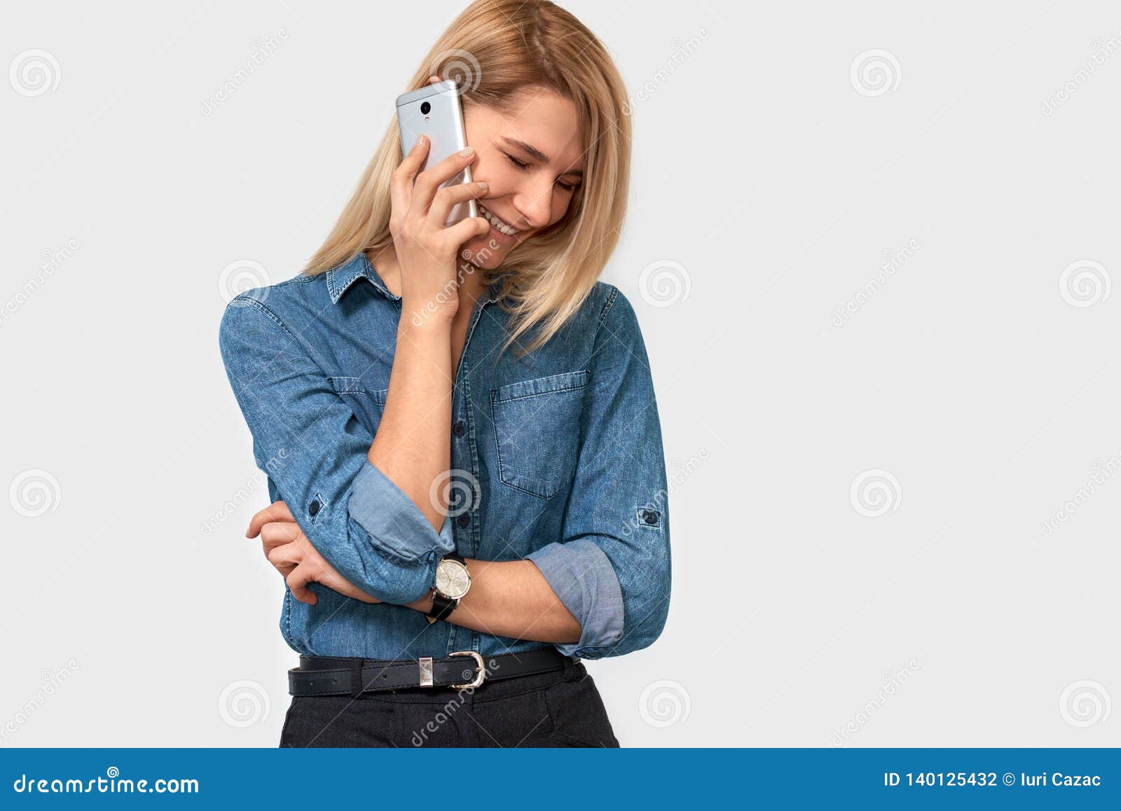 Beautiful Blonde Young Female Talking On Cell Phone To Her Boyfriend