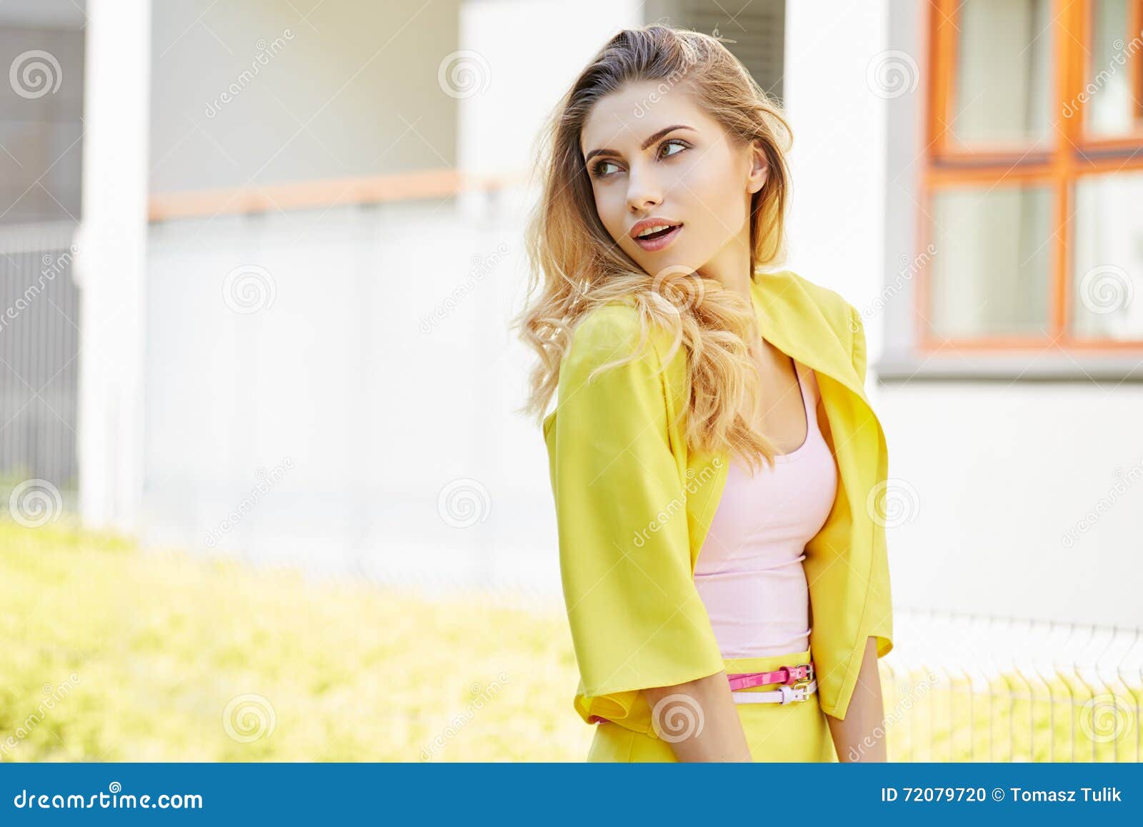 Beautiful Blonde Young Woman Walking on the Street Stock Photo - Image ...