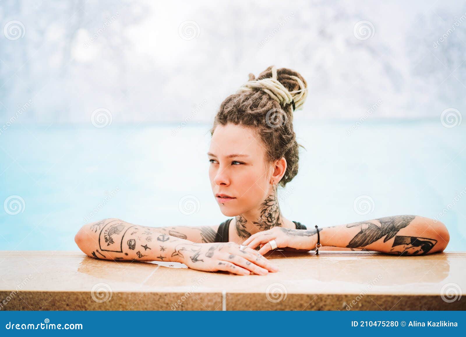 Blonde lesbian teens in the pool