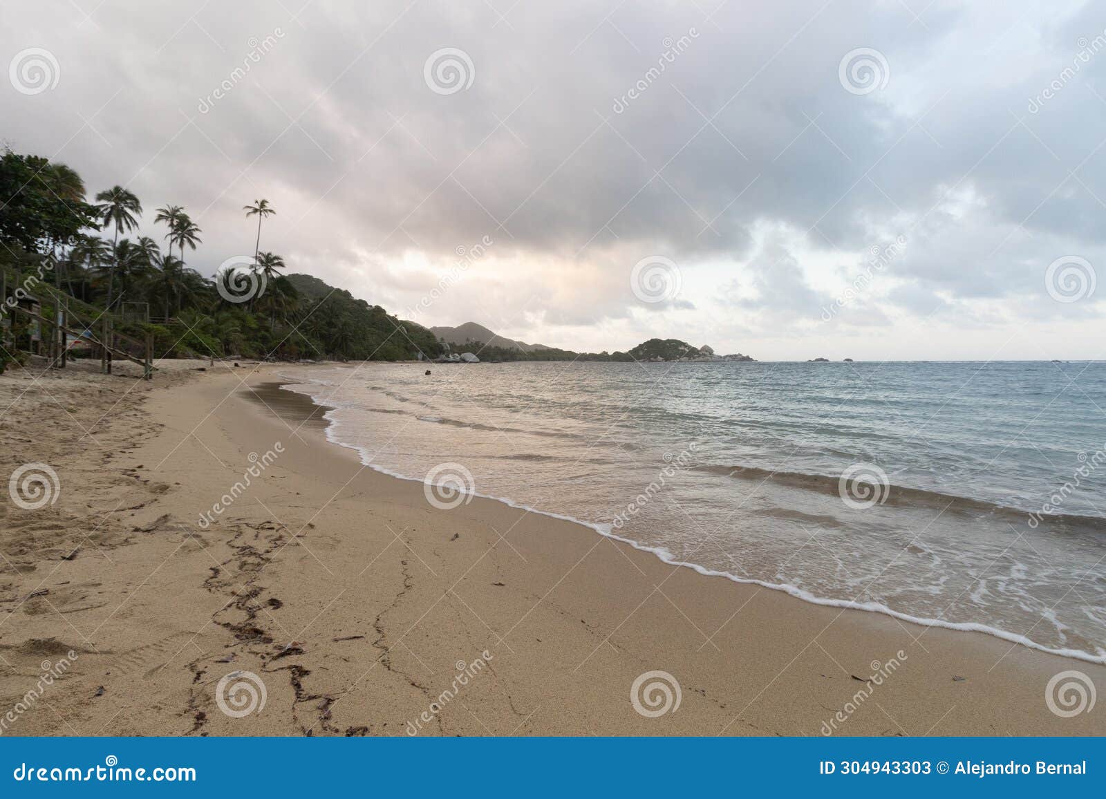 beautiful blue violet sunset at la piscina beach inside colombian tayrona park