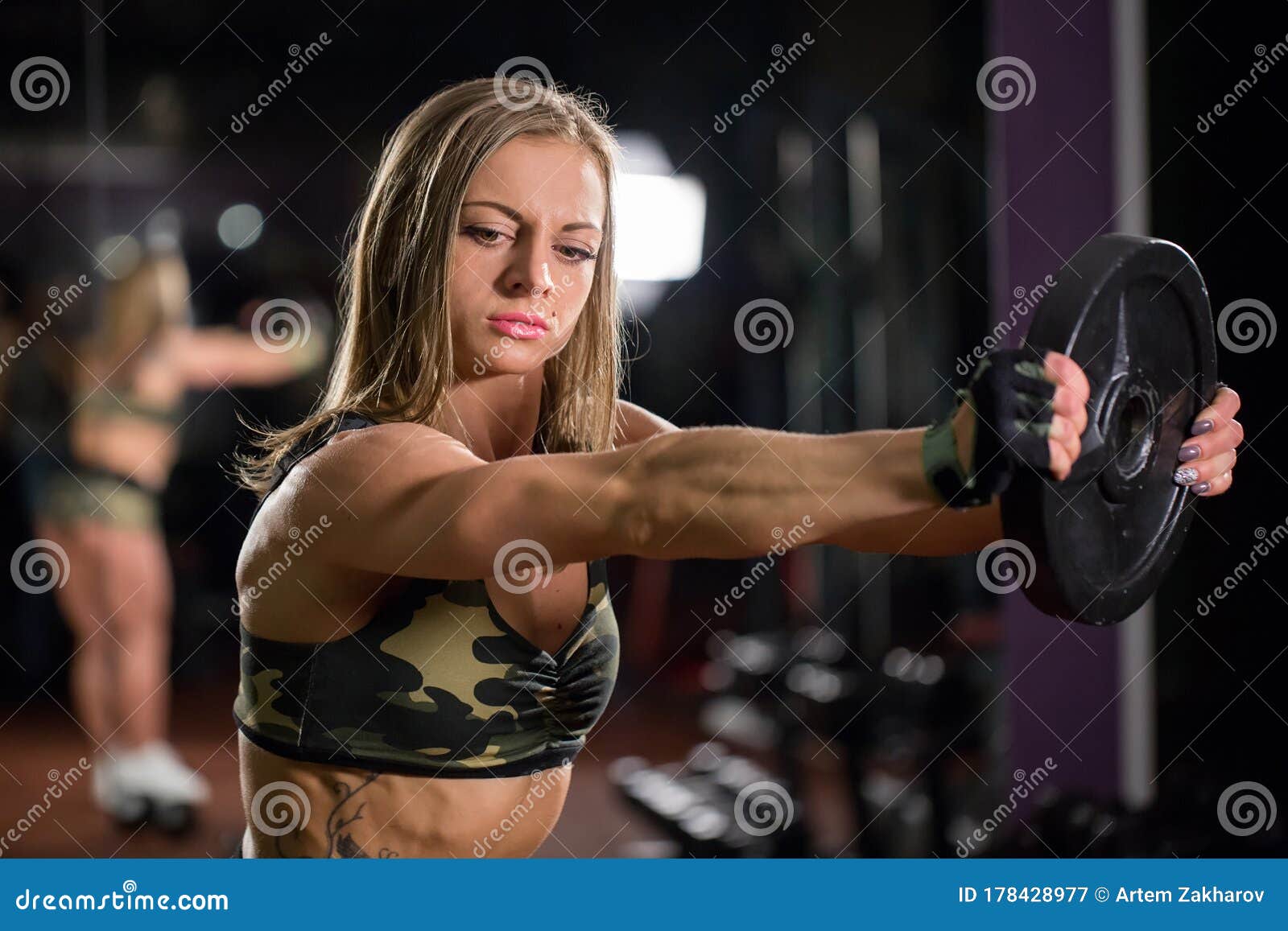 Beautiful Bodybuilder Woman With Lifting Dumbbells Sporty Girl Showing Her Well Trained Body