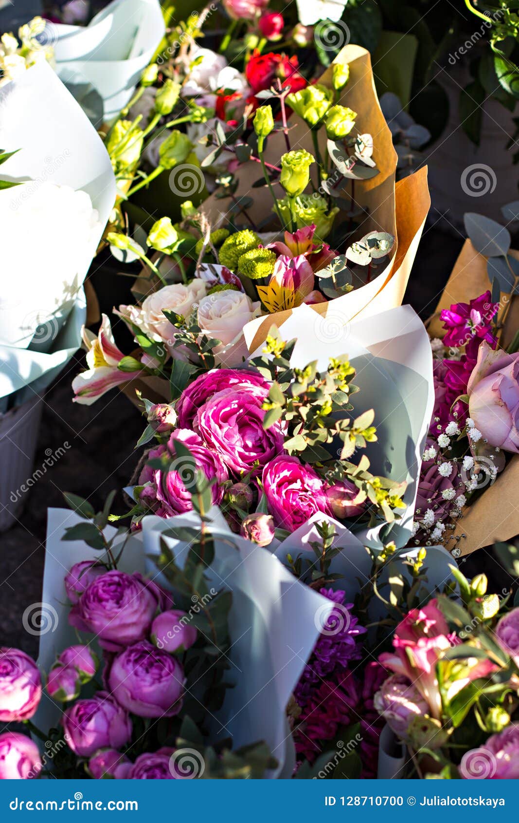 Beautiful Bouquets of Flowers on the Market. Showcase with Flowers ...