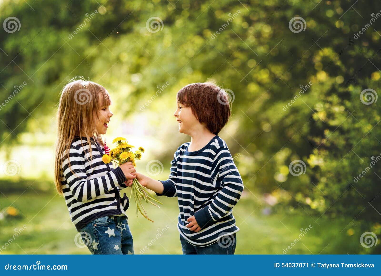  Beautiful  Boy  And Girl In A Park Boy  Giving Flowers To 