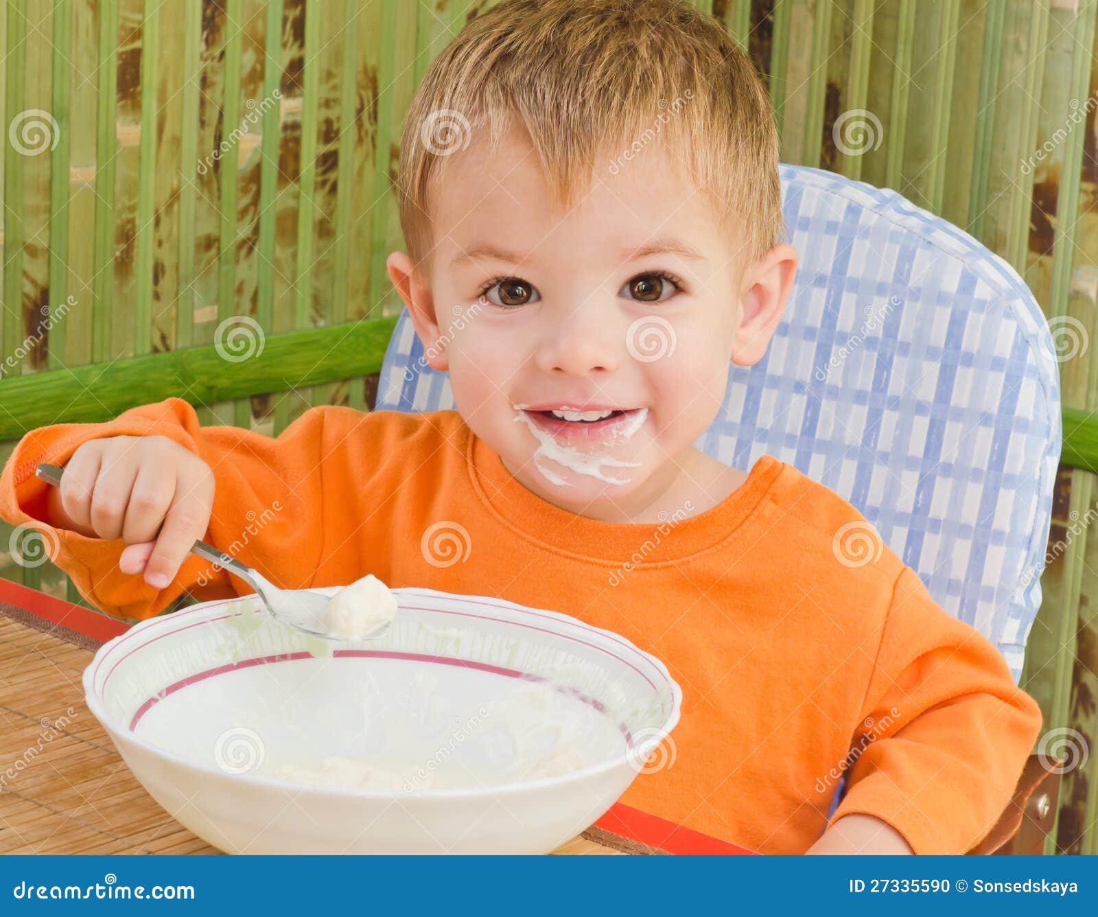 Beautiful boy after a meal stock photo. Image of childhood 27335590