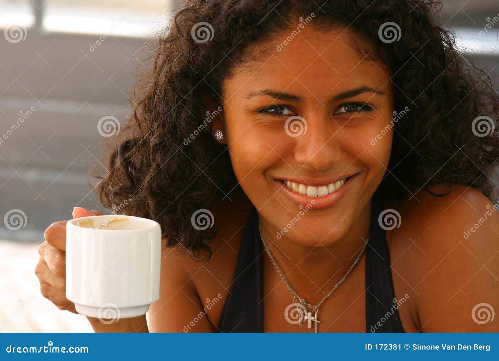 beautiful brazilian woman having coffee 172381