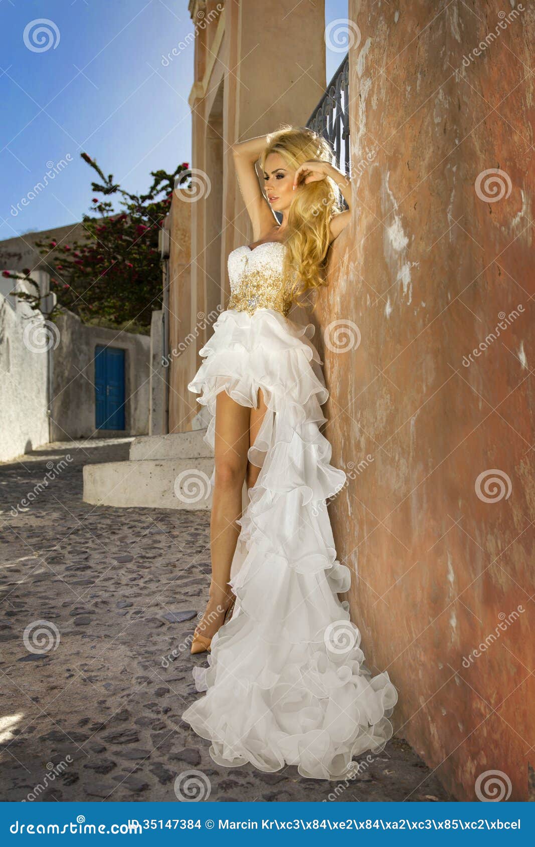 The Beautiful Bride In A Wedding Dress On Santorini In 