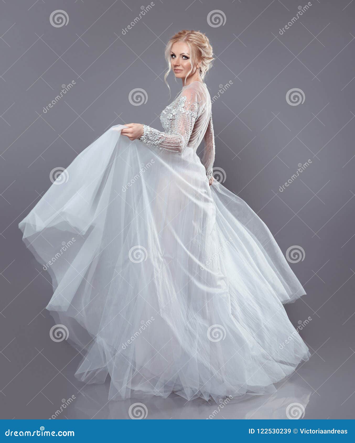 Fashionable Picture Of Elegant Young Woman In A Flowing White Gown Picture  And HD Photos | Free Download On Lovepik