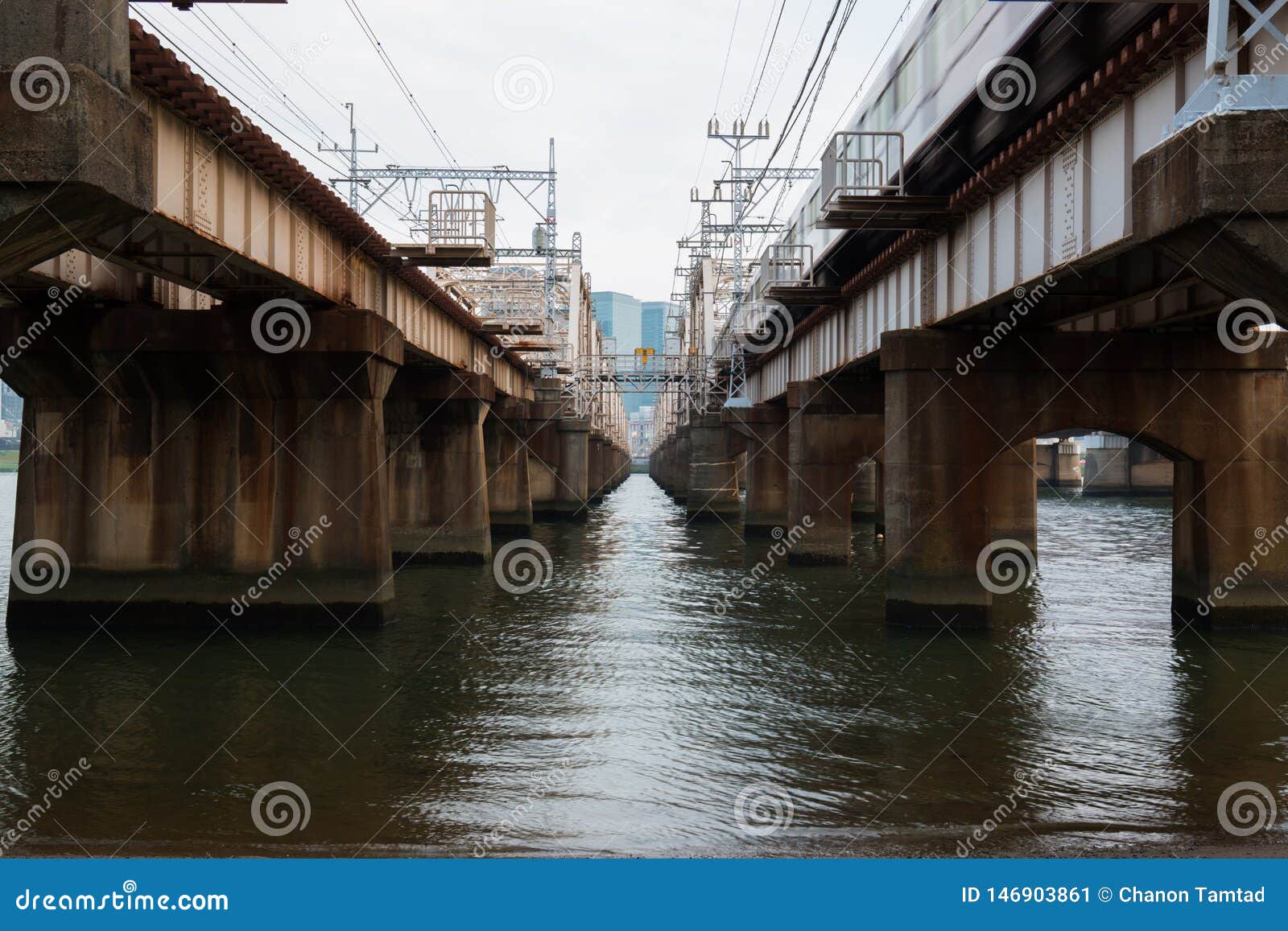 beautiful bridge at umeda from across the yodogawa river