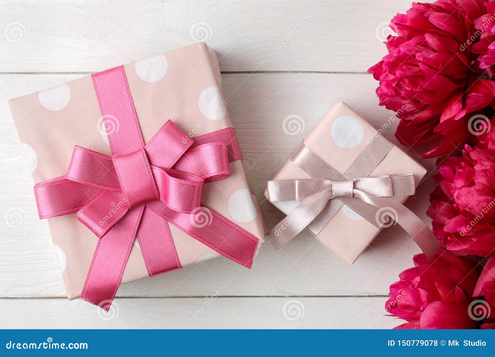 Beautiful Bright Pink Flowers Peonies And Gift Box On A