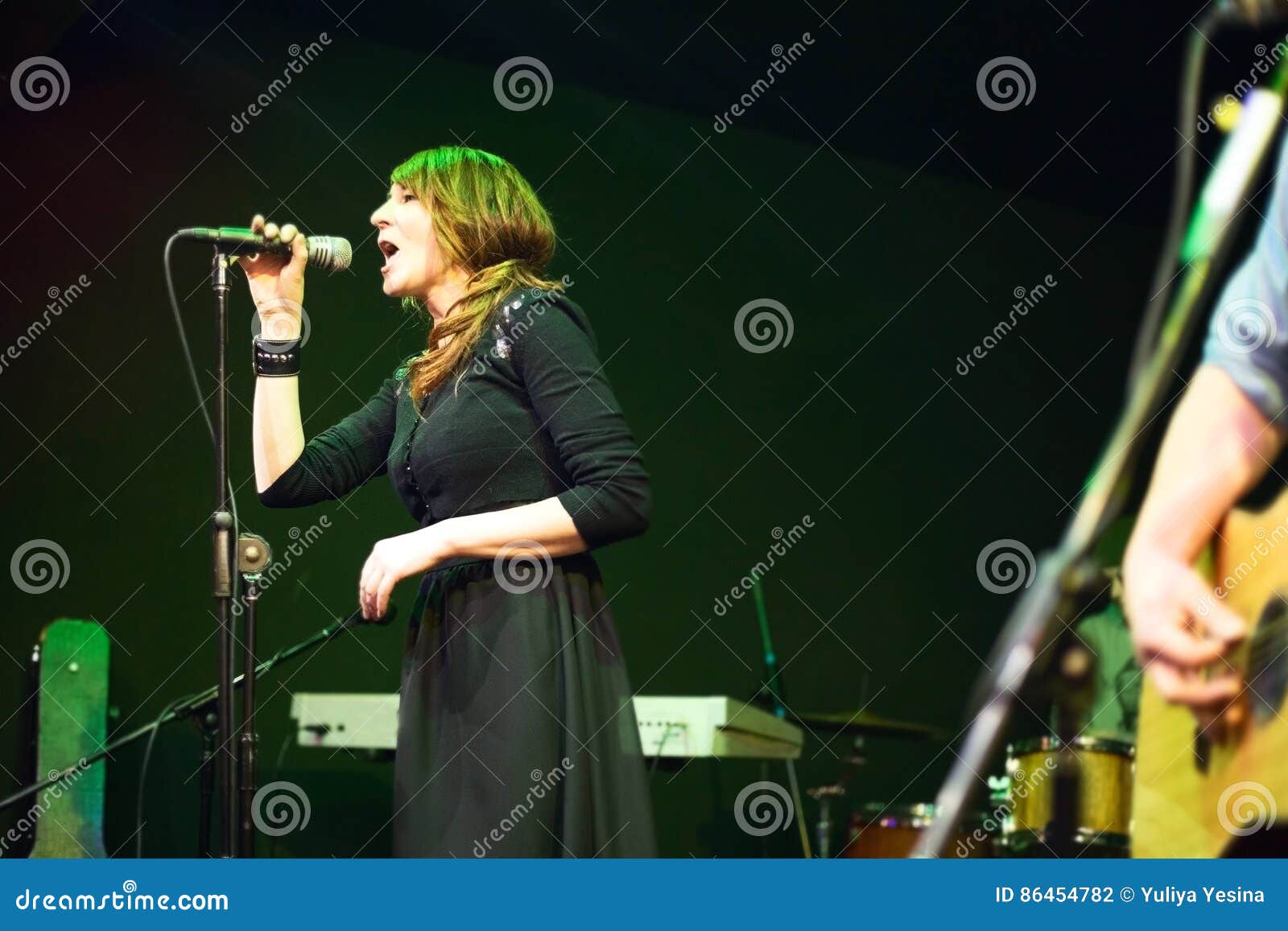 Beautiful Brunette Singer on the Scene Stock Photo - Image of female