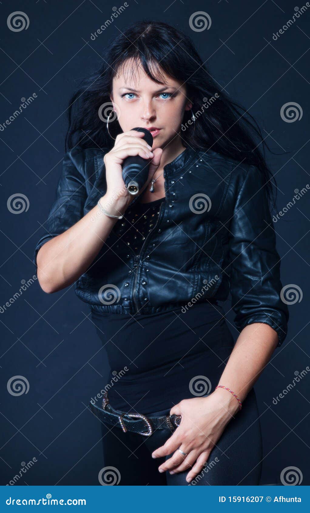 Beautiful brunette singing stock image. Image of equipment - 15916207