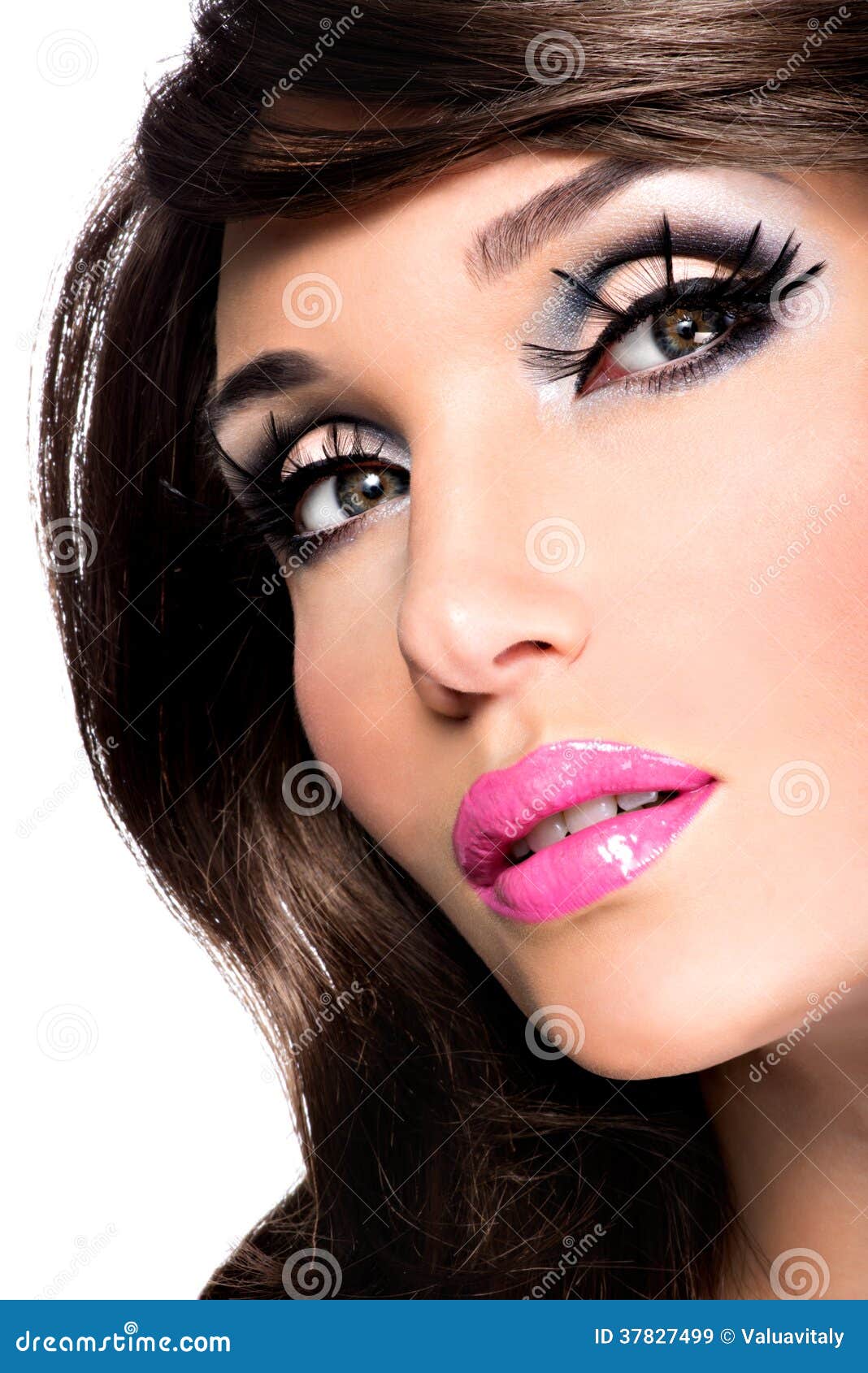 Beautiful brunette woman with bright fashion make-up. Beautiful brunette woman with bright fashion eyes and lips make-up
