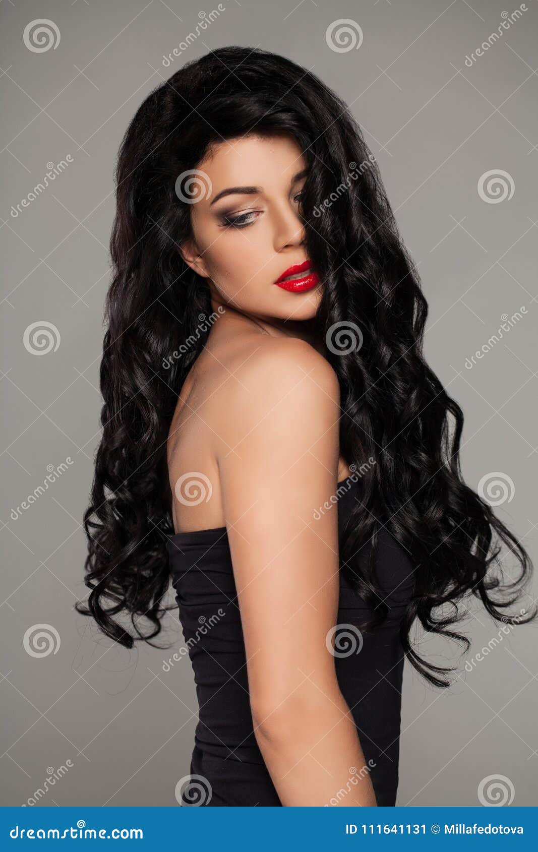 Beautiful Brunette Woman With Long Wavy Hairstyle Stock
