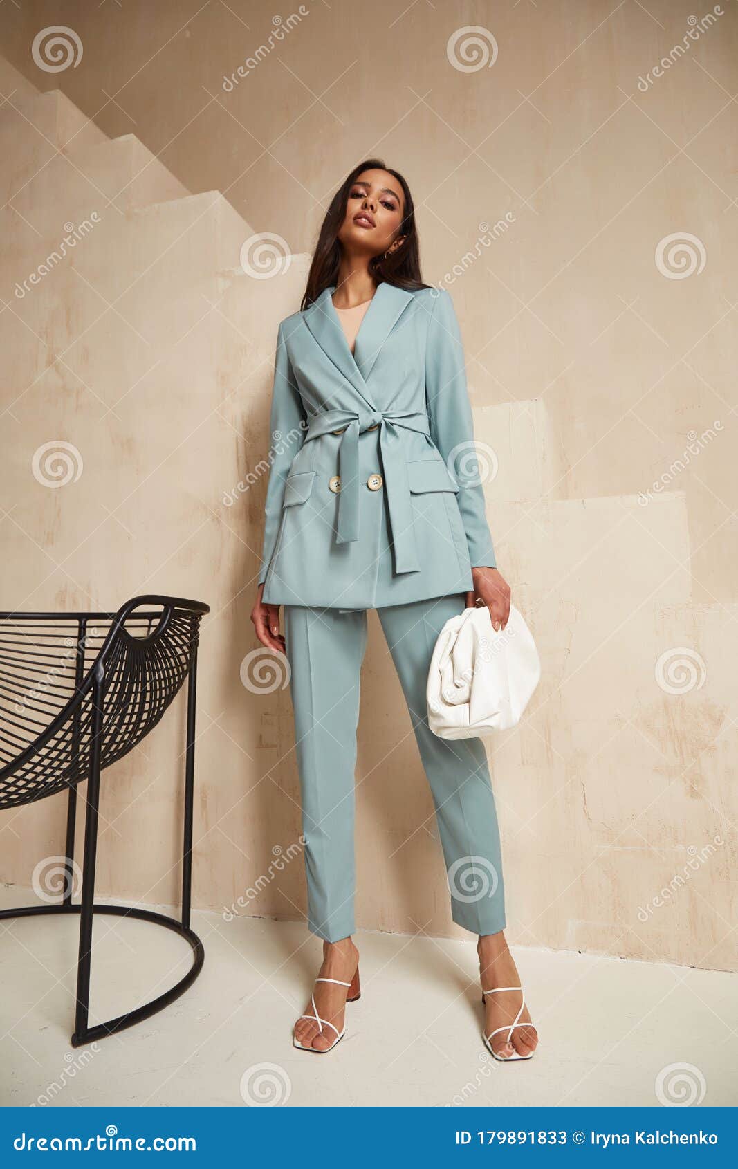 beautiful brunette woman natural make up wear fashion clothes casual dress code office style blue jacket pants suit 179891833