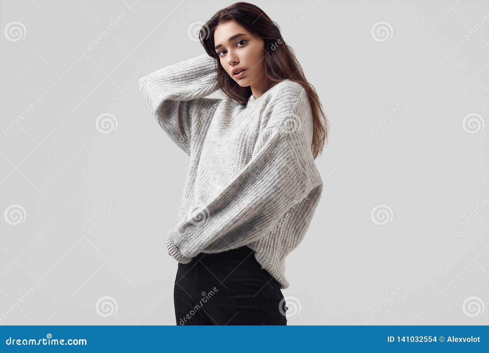 Beautiful Brunette Woman in Sweater Posing in Studio Stock Photo ...