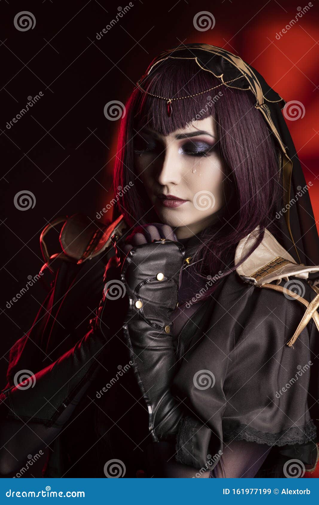 A Beautiful Busty Cosplay Girl Wearing An Erotic Leather Costume Sensually Cries With Tears In