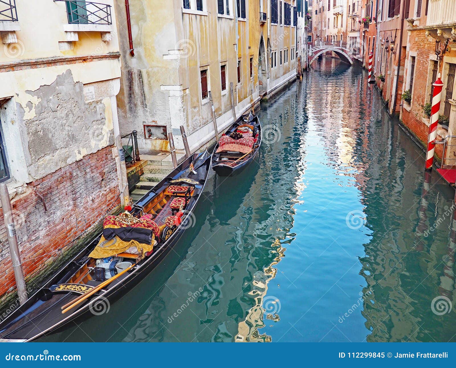 A Beautiful Canal and Gondolas in the City of Venice, Italy Stock Image ...